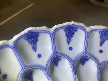 Een Chinese blauw-witte lotus-gemouleerde schotel, Kangxi merk en periode